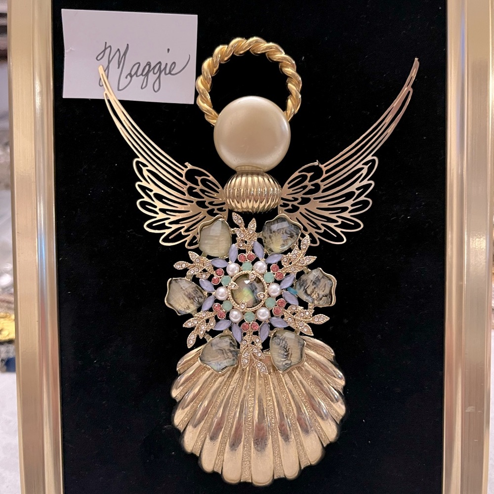Angel Maggie was created in beautiful, gold pearl, and a colorful brooch